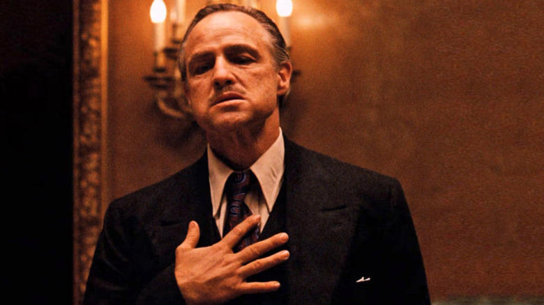Marlon Brando as Vito Corleone in The Godfather, addressing the room