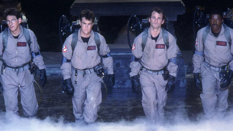Harold Ramis, Dan Aykroyd, Bill Murray, and Ernie Hudson as Egon Spengler, Ray Stantz, Peter Venkman, and Winston Zeddemore in Ghostbusters