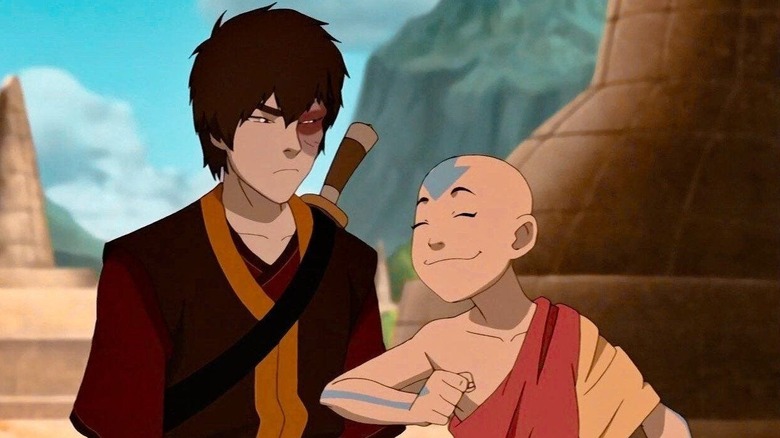 Aang nudging Zuko on Avatar: The Last Airbender