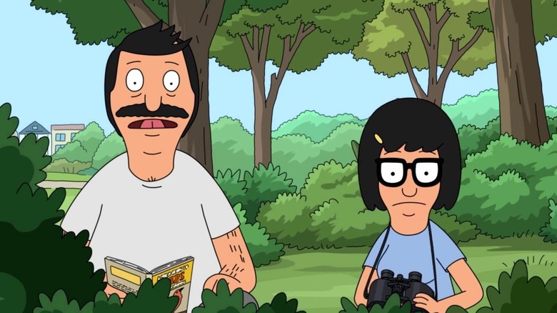 Bob and Tina Belcher hiding in the bushes on Bob's Burgers