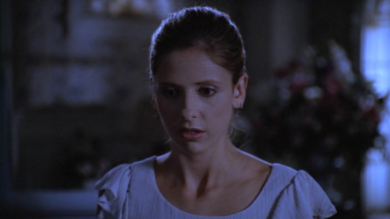 Buffy (Sarah Michelle Gellar) at a graveyard at night on Buffy the Vampire Slayer