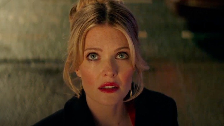 Meghann Fahy looks unnerved as Violet in Drop
