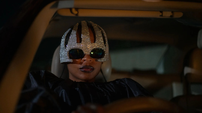 Shula, wearing a glittery mask in On Becoming a Guinea Fowl