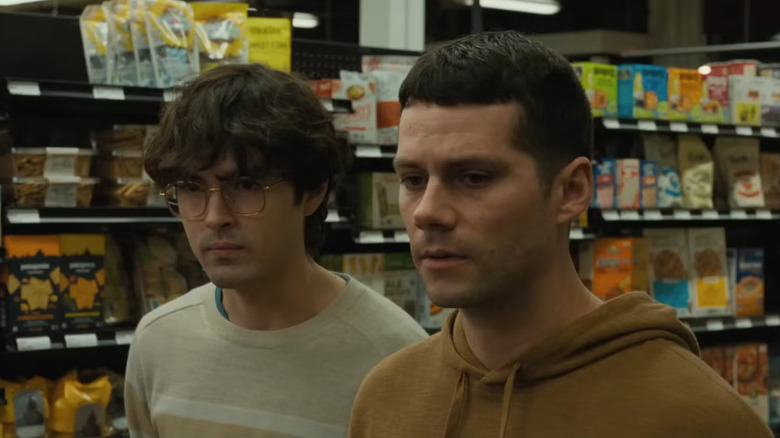 Dennis and Roman in a ritzy grocery store in Twinless
