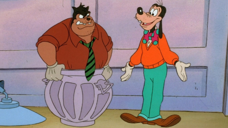Pete is stuck in a garbage can while looking at Goofy on Goof Troop