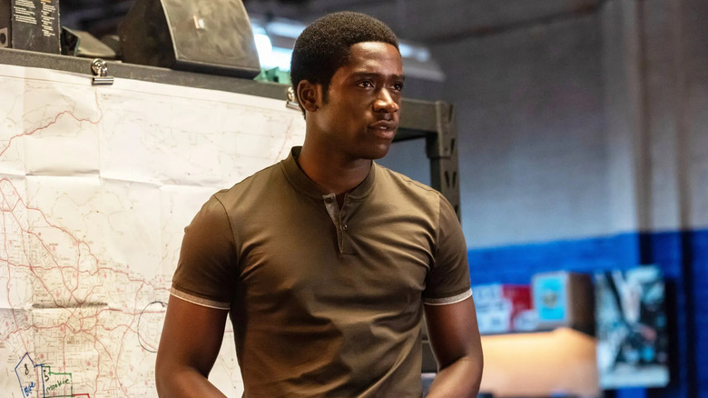 Damson Idris as Franklin Saint standing next to a map on Snowfall