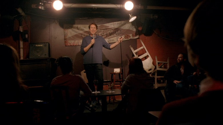 Pete Holmes as himself on stage in Crashing