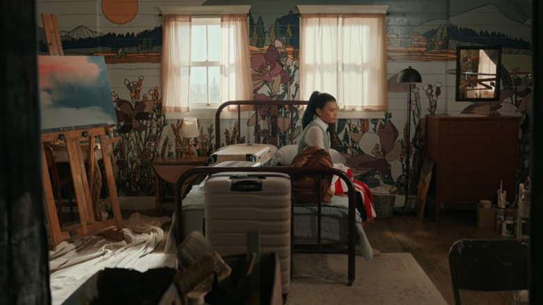 Jackie (Nikki Rodriguez) sitting in new bedroom in My Life With the Walter Boys