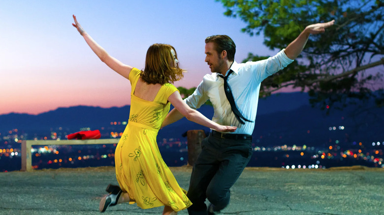 Emma Stone and Ryan Gosling as Mia and Sebastian, dancing together over L.A. in La La Land.