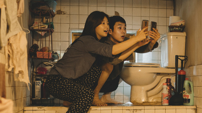 Choi Woo-shik as Kim Ki-woo and Park So-dam as Kim Ki-jung in Parasite.