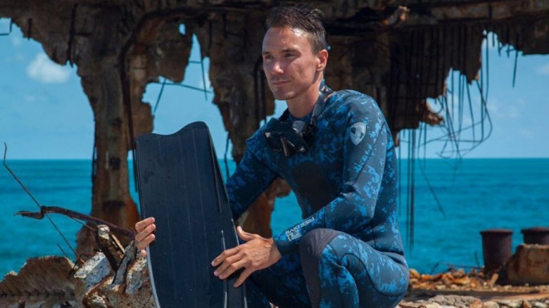 Rob Stewart surf board wetsuit
