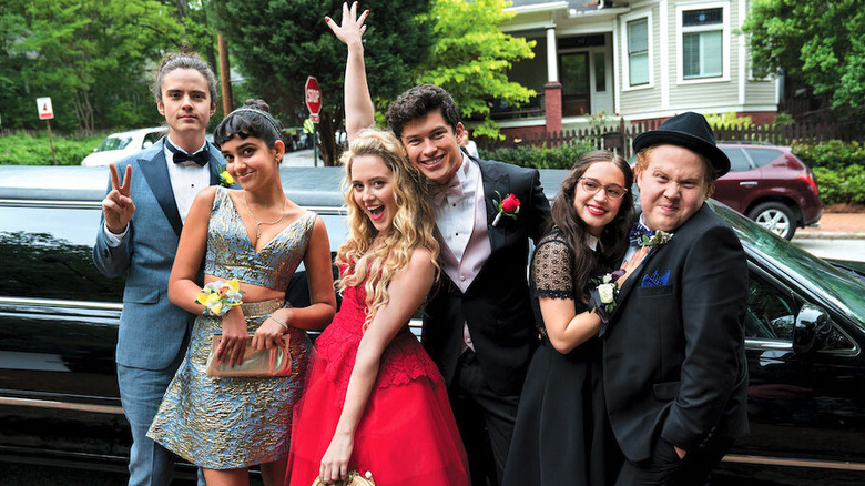 Students pose for prom photo in Blockers