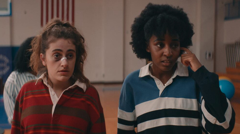 PJ (Rachell Bennott) and Josie (Ayo Edebiri) in gym with injuries in Bottoms