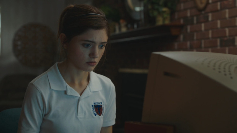 Alice (Natalia Dyer) staring at computer in Yes God Yes