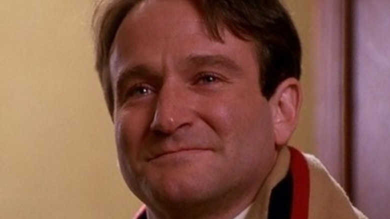 Robin Williams in Dead Poets Society wearing a scarf