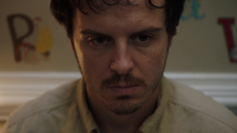 Donald Devlin (Andrew Scott) with letters behind him in A Dark Place