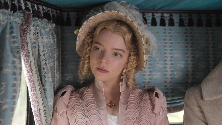 Anya Taylor-Joy as Emma Woodhouse looking to the side in Emma