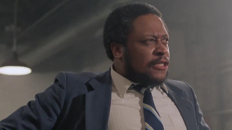 Ron Canada as Graydon look angry in Adventures in Babysitting