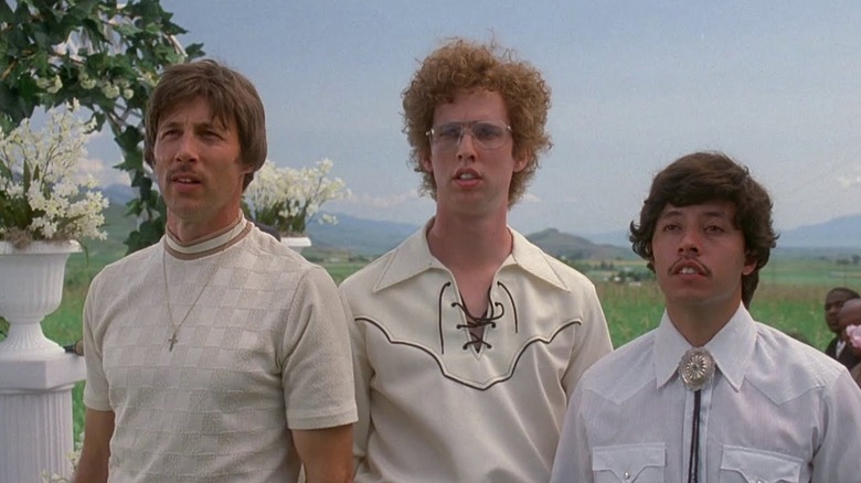 Jon Gries as Uncle Rico stands next to Jon Heder as Napoleon and Efren Ramirez as Pedro in Napoleon Dynamite