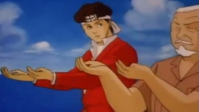 Daniel and Mr. Miyagi training in the Karate Kid animated show
