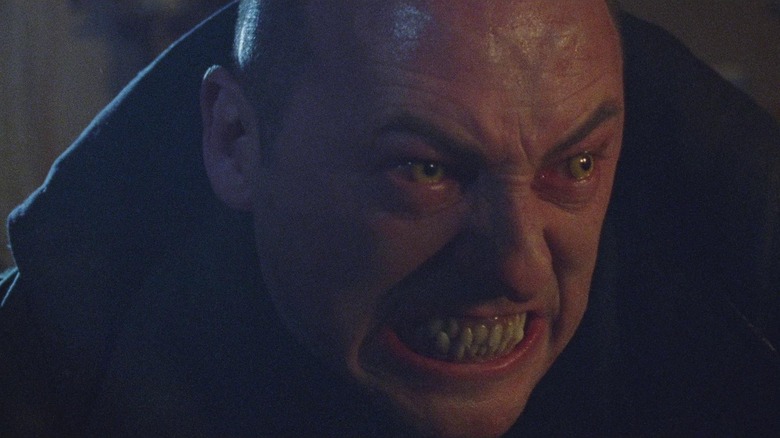 Sergeant Harry G. Wells (Sean Pertwee) transforming into a werewolf in Dog Soldiers