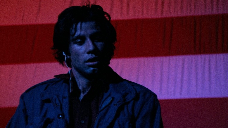 Jack (John Travolta) experiences defeat among fireworks in Blow Out