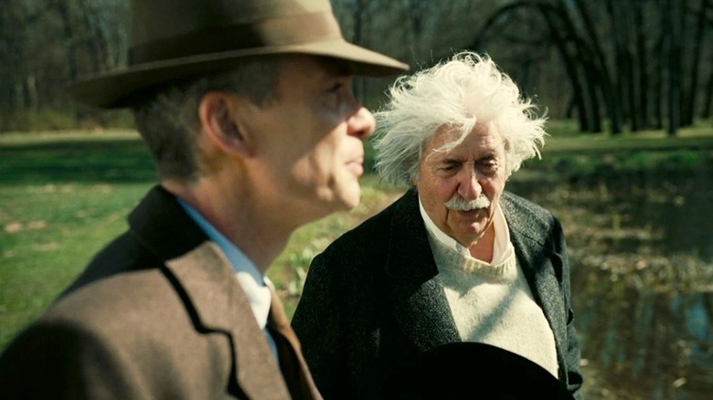J. Robert Oppenheimer (Cillian Murphy) speaks with Albert Einstein (Tom Conti) in Oppenheimer