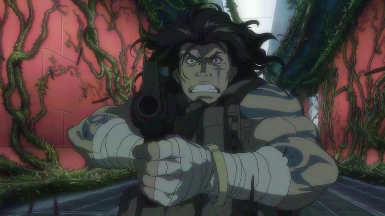 Man levels a shotgun