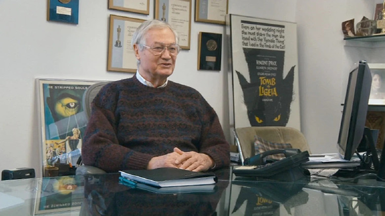 Roger Corman among posters of his work