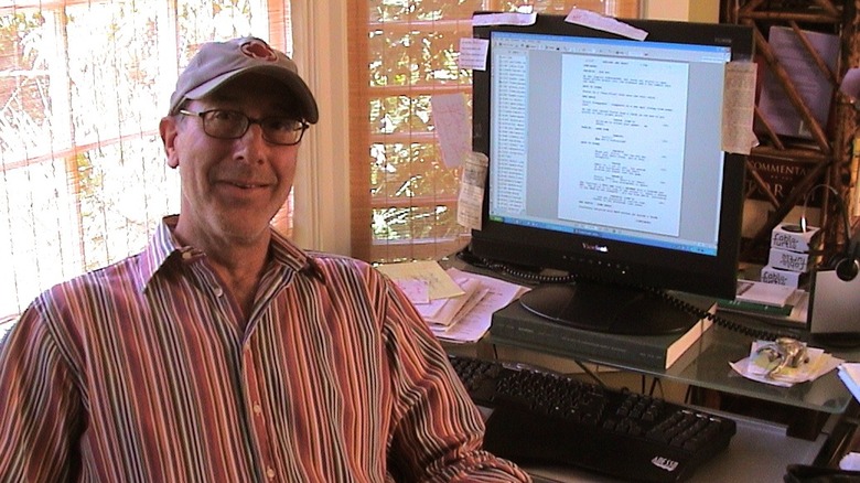 Steven E. de Souza at his writing computer