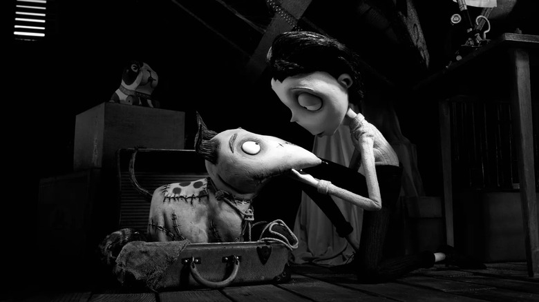 Charlie Tahan as Victor Frankenstein looks at his dog Sparky in Frankenweenie