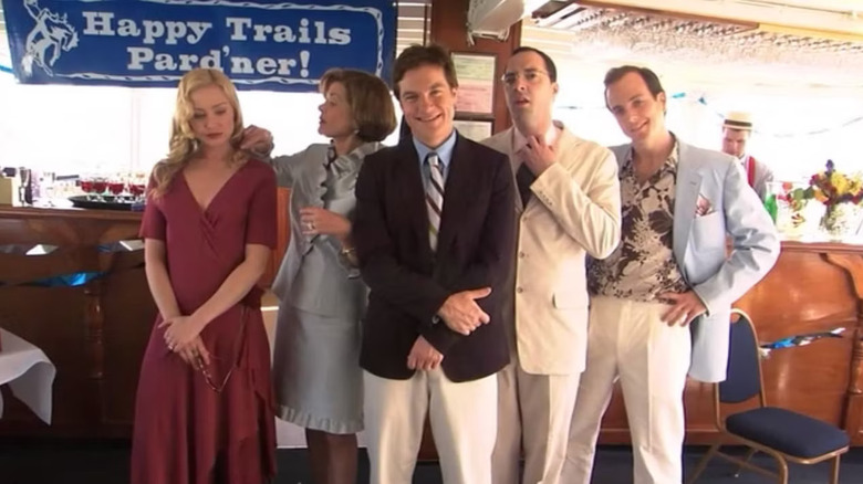 The Bluth family poses for a portrait on their yacht on Arrested Development