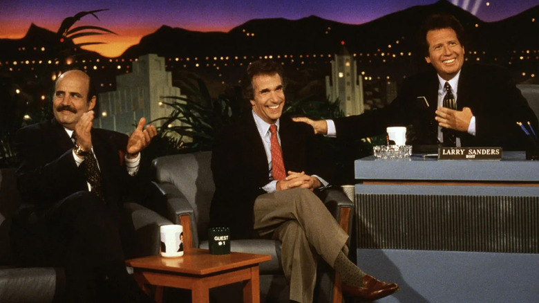 Garry Shandling and Jeffrey Tambor as Larry and Hank, interviewing a guest on the Larry Sanders Show