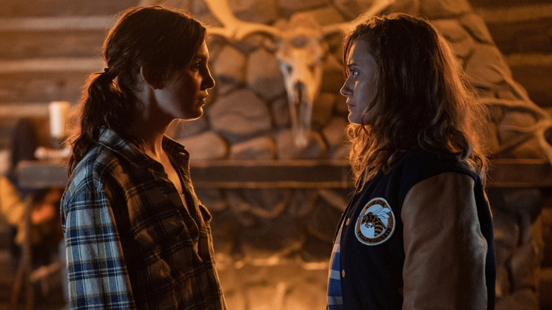 Sophie Nélisse and Ella Purnell as Young Shauna and Jackie in the wildness lodge on Yellowjackets