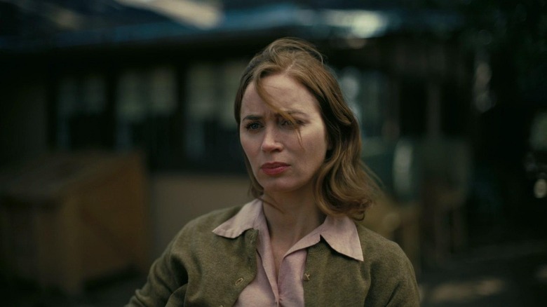 Emily Blunt as Kitty Oppenheimer in Oppenheimer, the wind messing up her hair