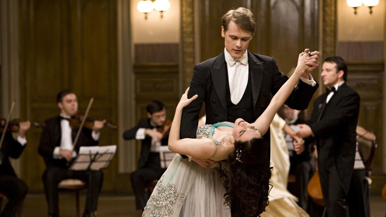 Sam Heughan as Ashton dipping Julie in A Princess for Christmas