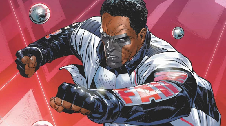 Mister Terrific falls, surrounded by T Spheres