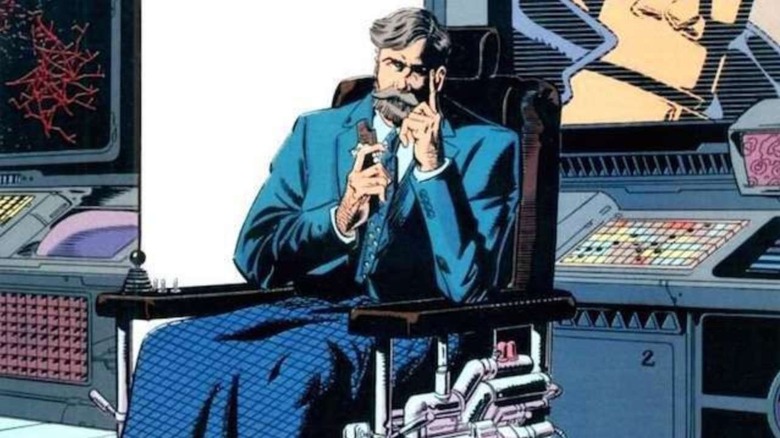 Niles Caulder sitting in a high tech wheel chair in a control room