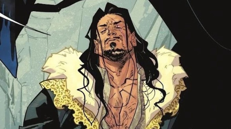 Vandal Savage cocks his head back