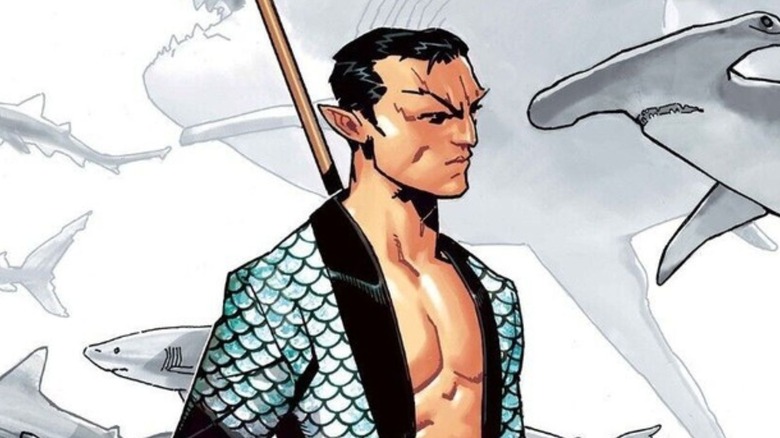Namor wearing a scaled tux with sharks