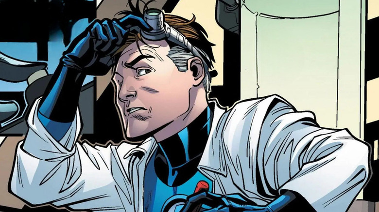Reed Richards lifts up goggles to look