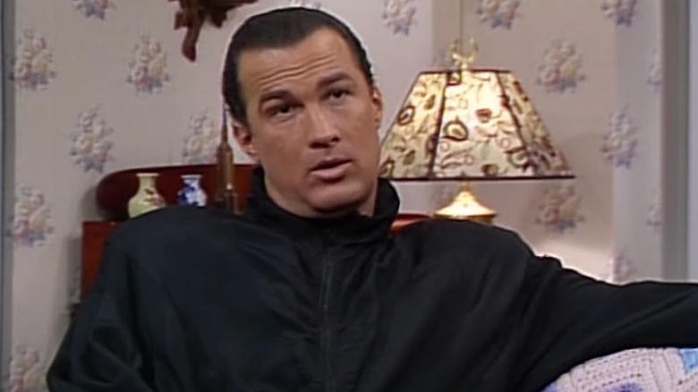 Steven Seagal as himself sitting on a couch on SNL