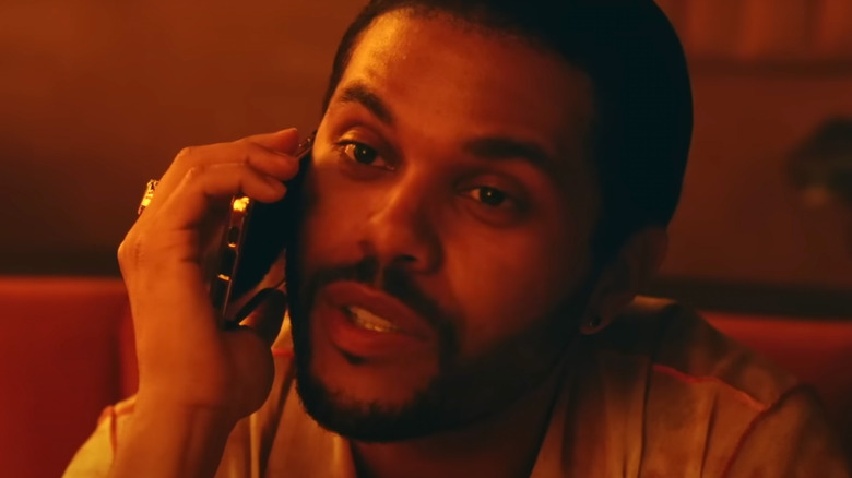 Abel Tesfaye as Tedros talking on the phone in The Idol