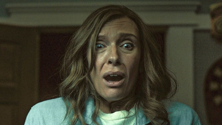 Annie Graham (Toni Collette) reacts in shock in Hereditary
