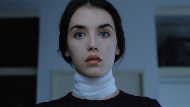 Anna (Isabelle Adjani) stares blankly ahead in Possession (1981)