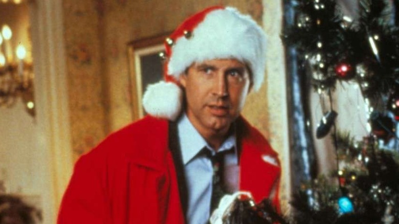 Chevy Chase as Clark Griswold dressed as Santa in Christmas Vacation