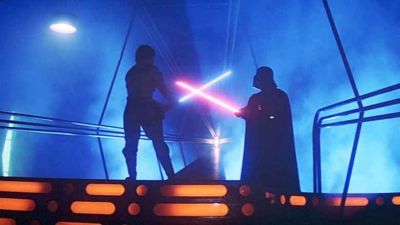Mark Hamill as Luke Skywalker crossing lightsabers with David Prowse as Darth Vader in The Empire Strikes Back