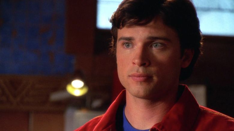 Tom Welling in red jacket and blue shirt as Clark Kent in Smallville