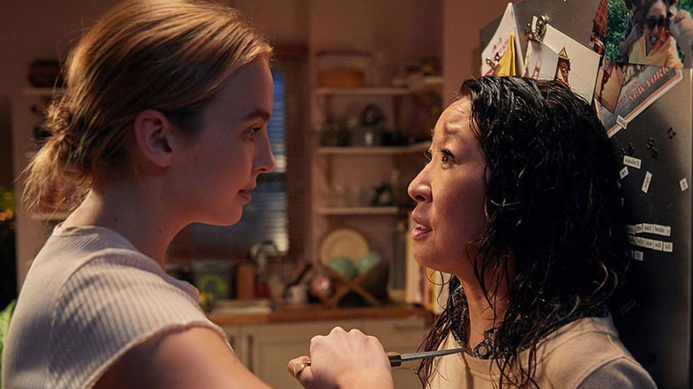 Jodie Comer and Sandra Oh as Villanelle and Eve, at each others' throats in Killing Eve