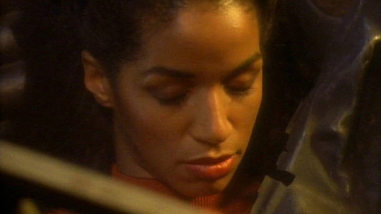 Jennifer Sisko (Felecia M. Bell) lies dead under rubble in Star Trek: Deep Space Nine